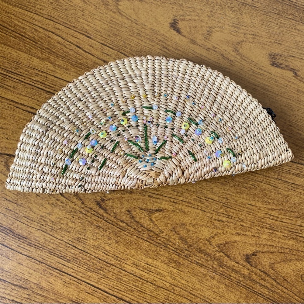 Weaved wicker clutch with beading details
